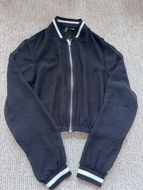 Divided Black Jacket with White Trim